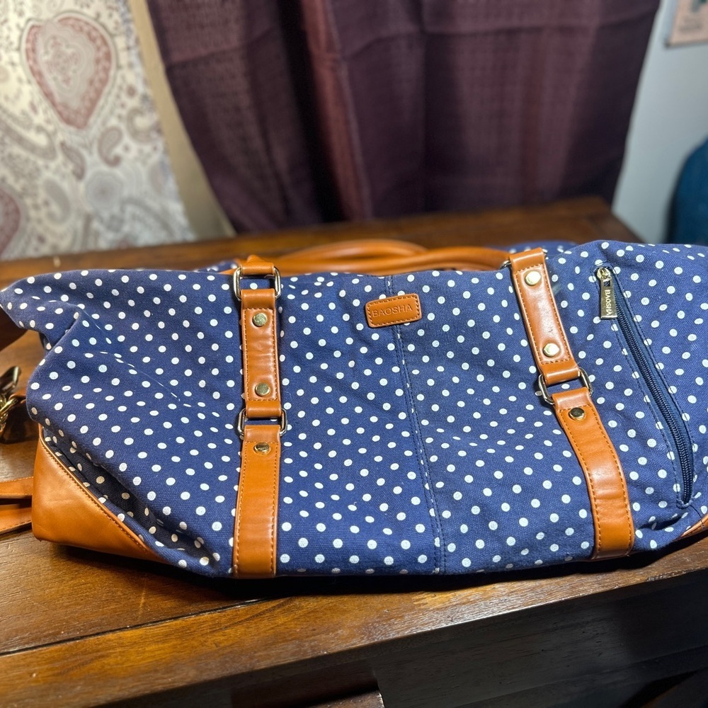 Stylish Navy Polka Dot Travel Bag with Tan Details​ - Picture 2 of 12